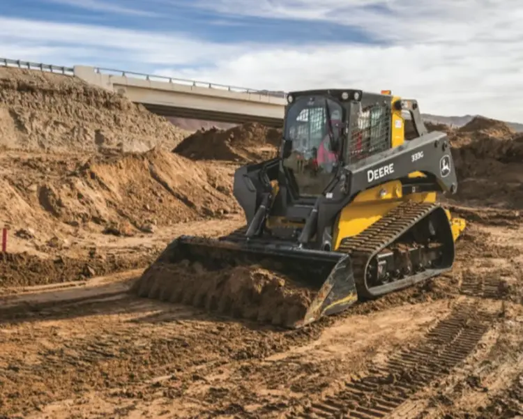 333g track loader moving dirt as a construction site